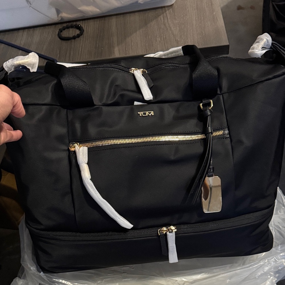 TUMI Voyageur Black Contine Weekender Duffel Bag with Gold Accents